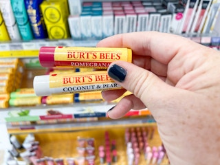 burt bees lip balm being held up in store
