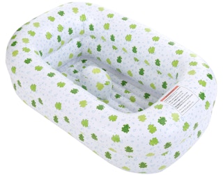 stock photo of mommys helper inflatable baby bathtub on white background