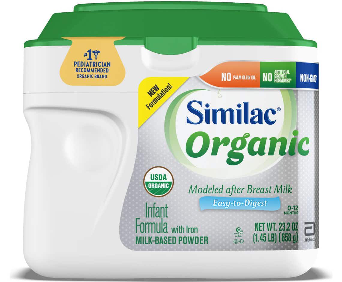 stock photo of similac organic formula with green lid on white background