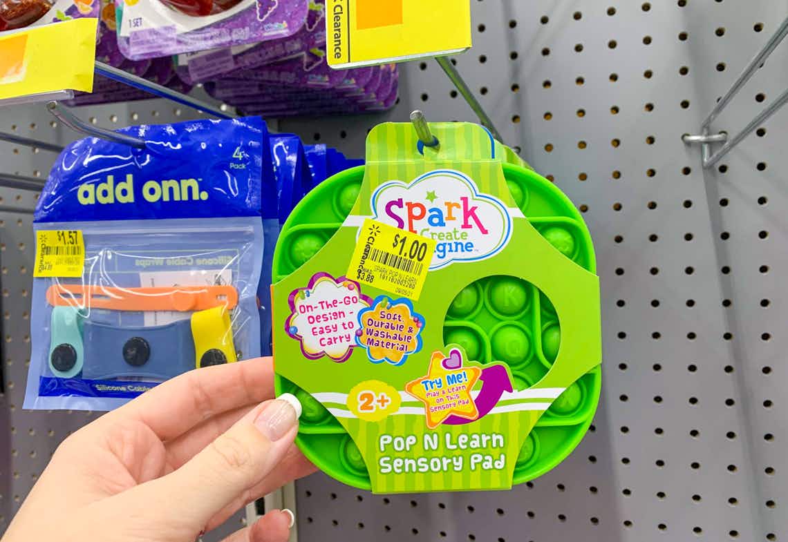 spark create imagine pop n learn sensory pad hanging on walmart hook with clearance price tag
