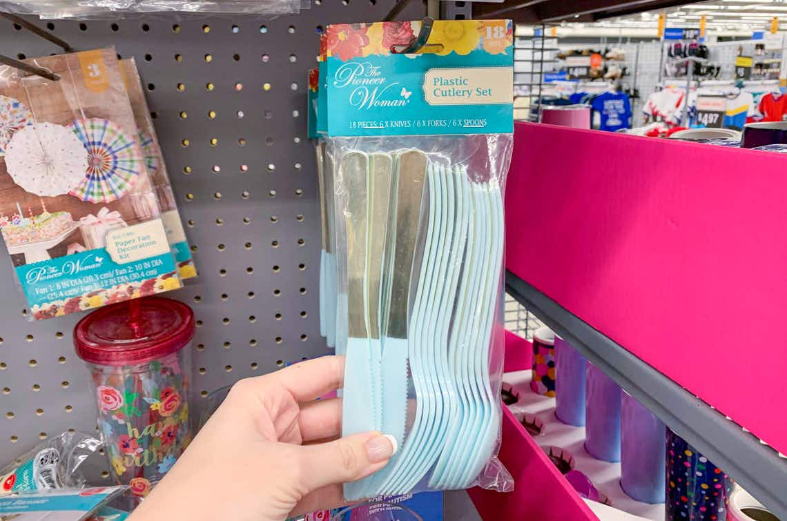 the pioneer woman plastic cutlery hanging on hook