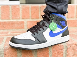 nike sneaker on a brick floor