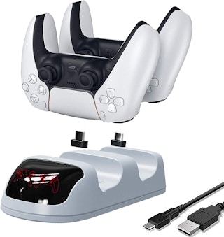 Two PS5 controllers with a charger.