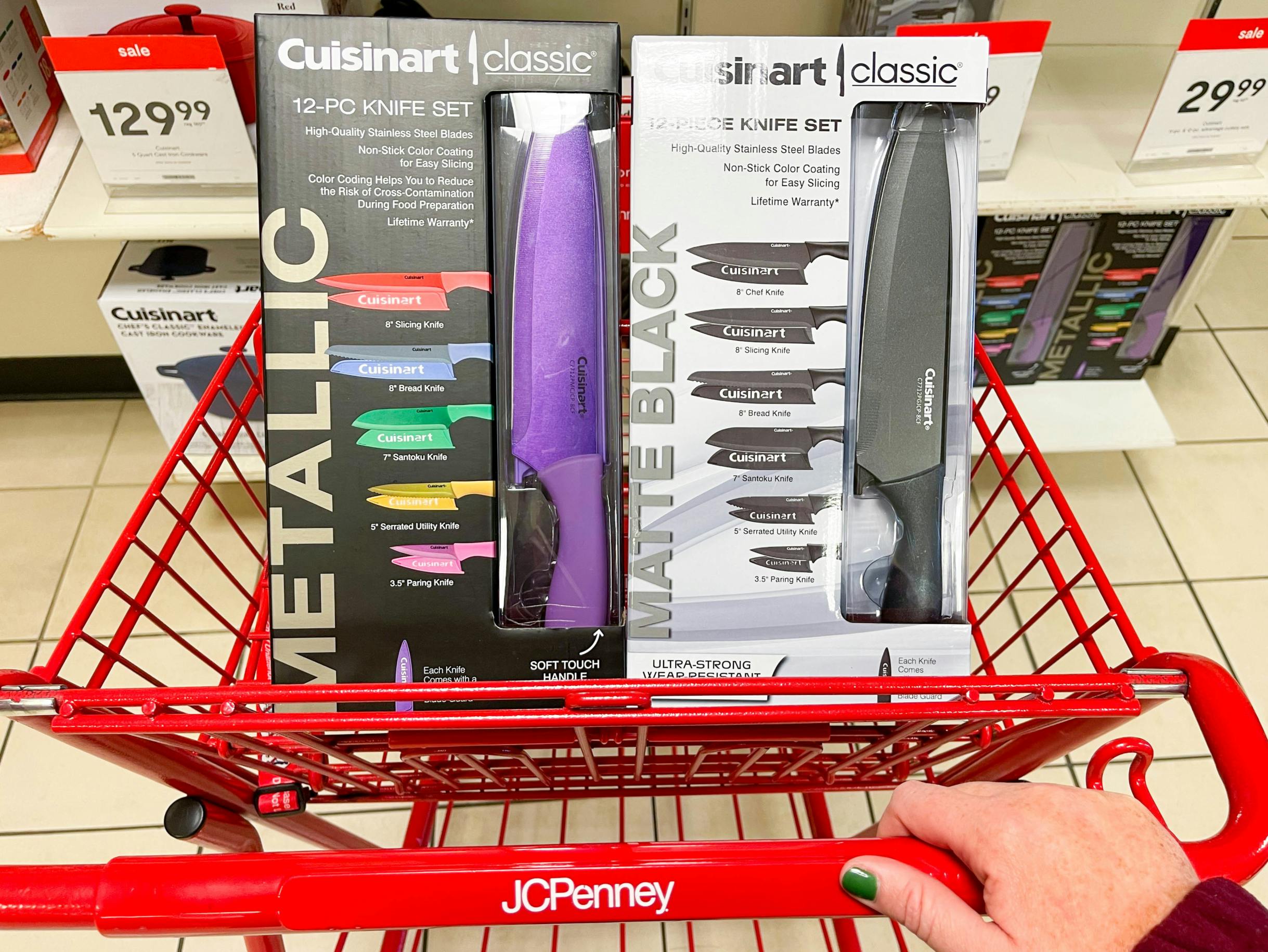 Cuisinart 12 pack knife sets in a JCPenney shopping cart parked in front of the knife shelf.