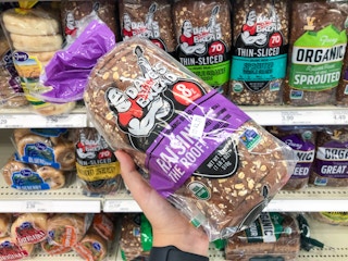 hand holding dave's killer raisin bread at target