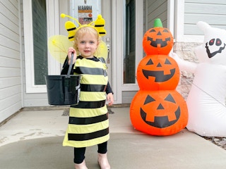 little girl dressed as a bee