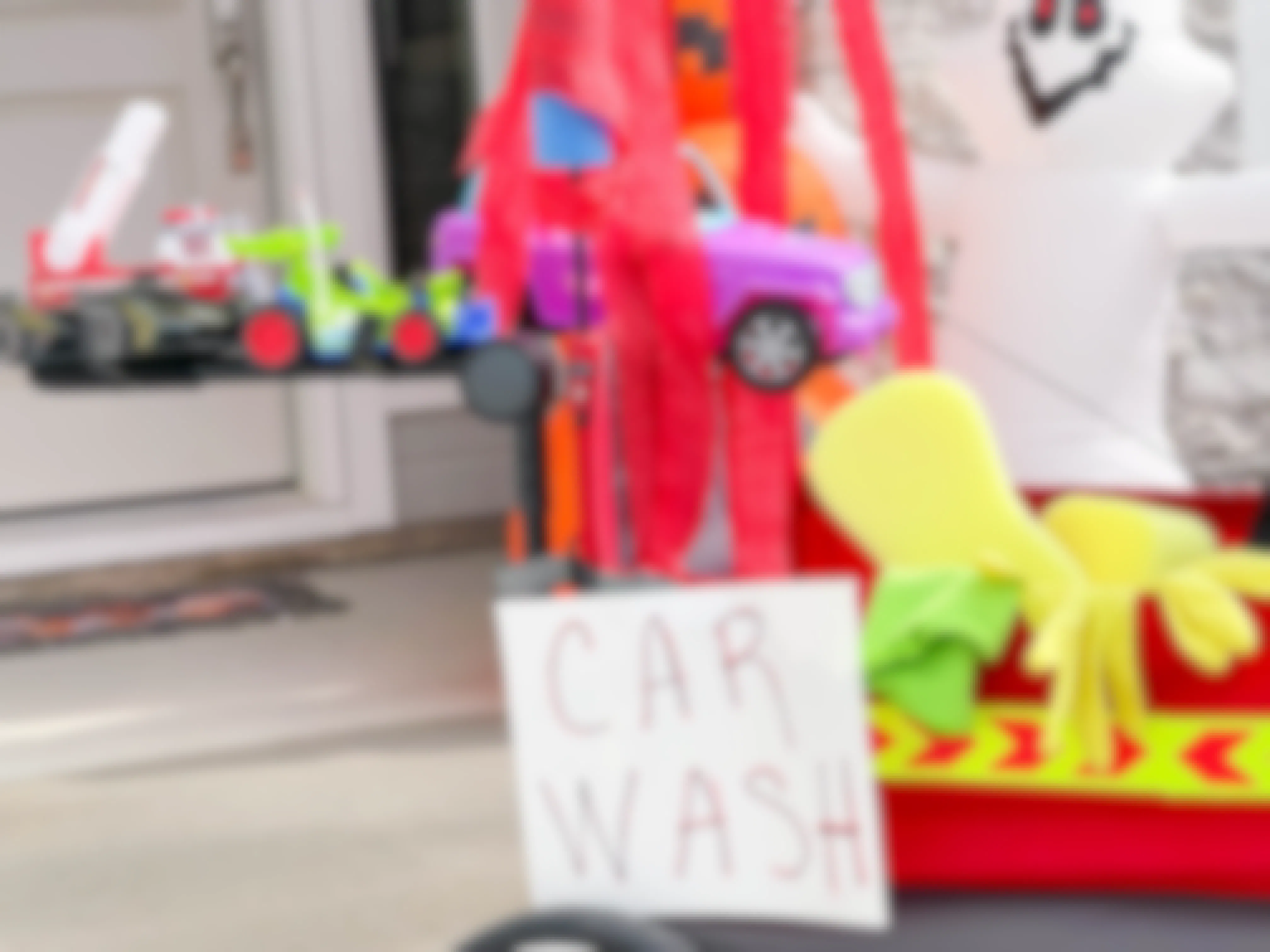 car wash wagon costume with streamers, sponges and gloves