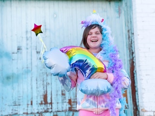 A kid dressed up in a DIY unicorn costume.