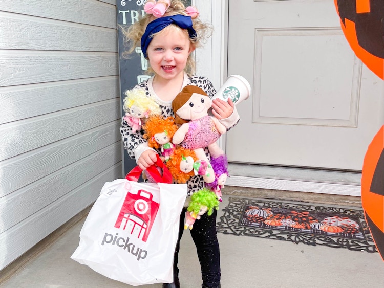 kid in hot mess mama costume in front of door