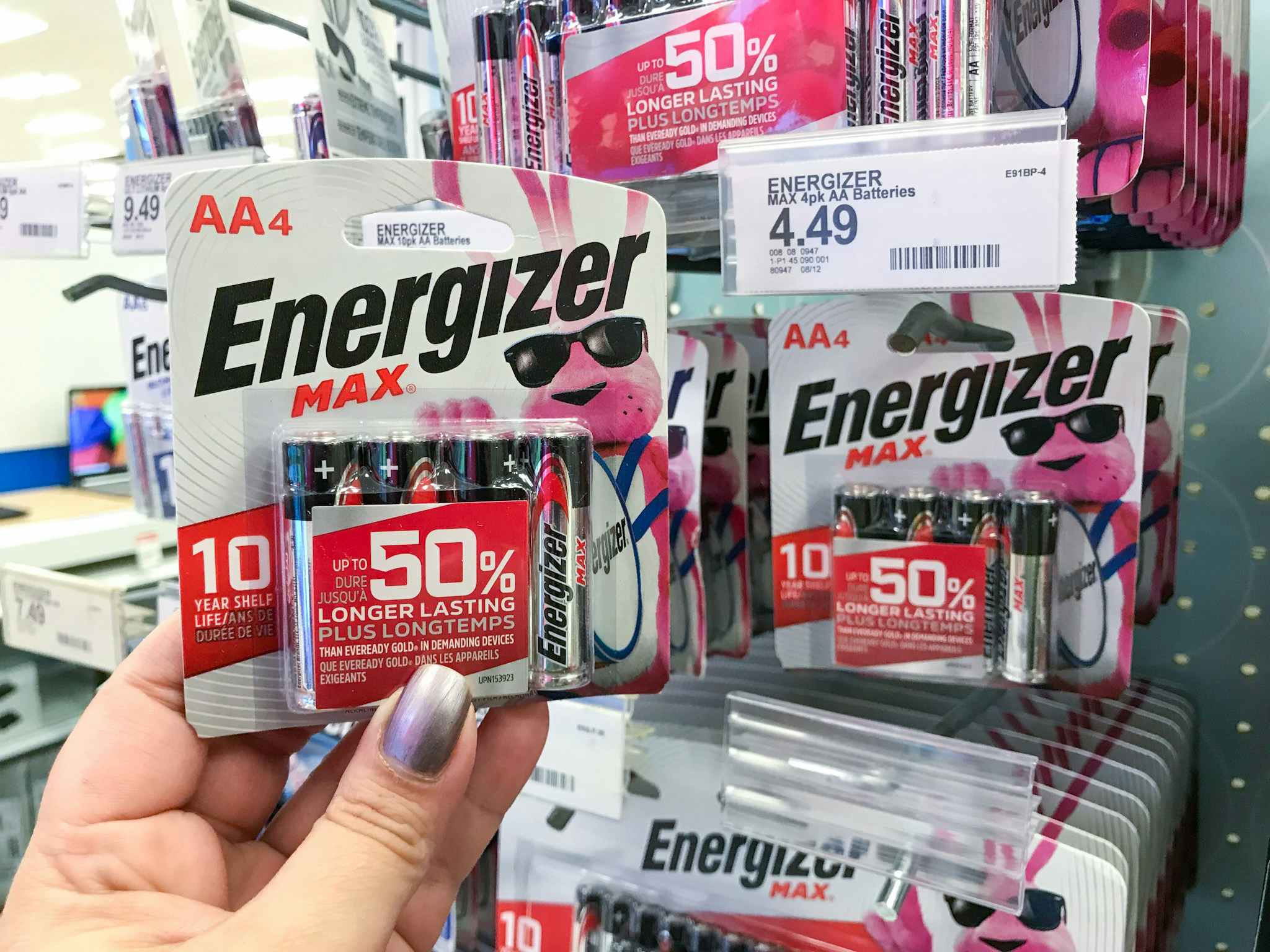 hand holding a pack of energizer max batteries at target