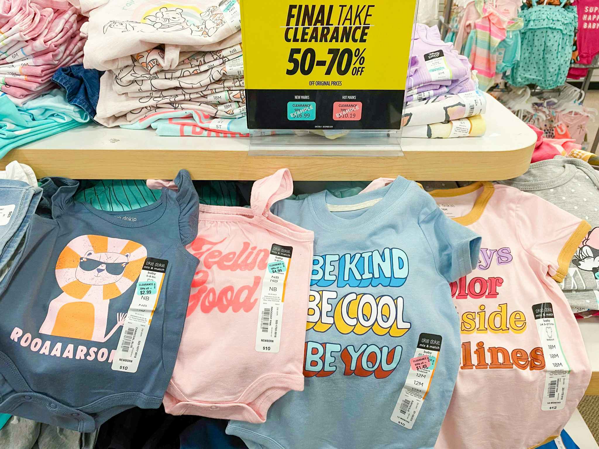 clearance baby bodysuits display