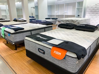 mattresses laid out in a store