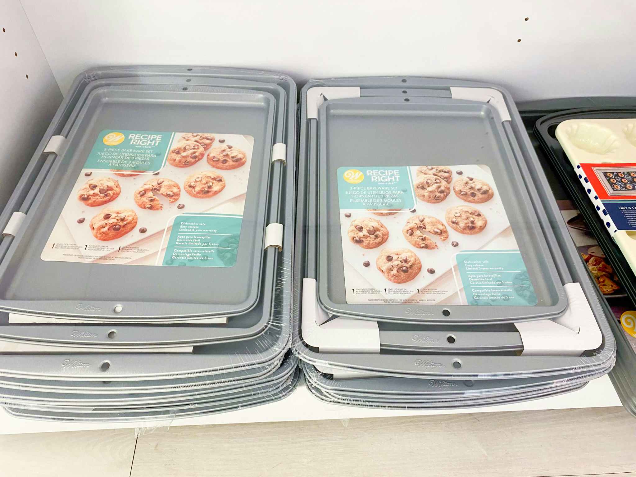 wilton cookie sheets on shelf