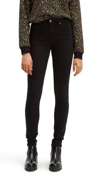 A woman wearing Levi's skinny jeans.
