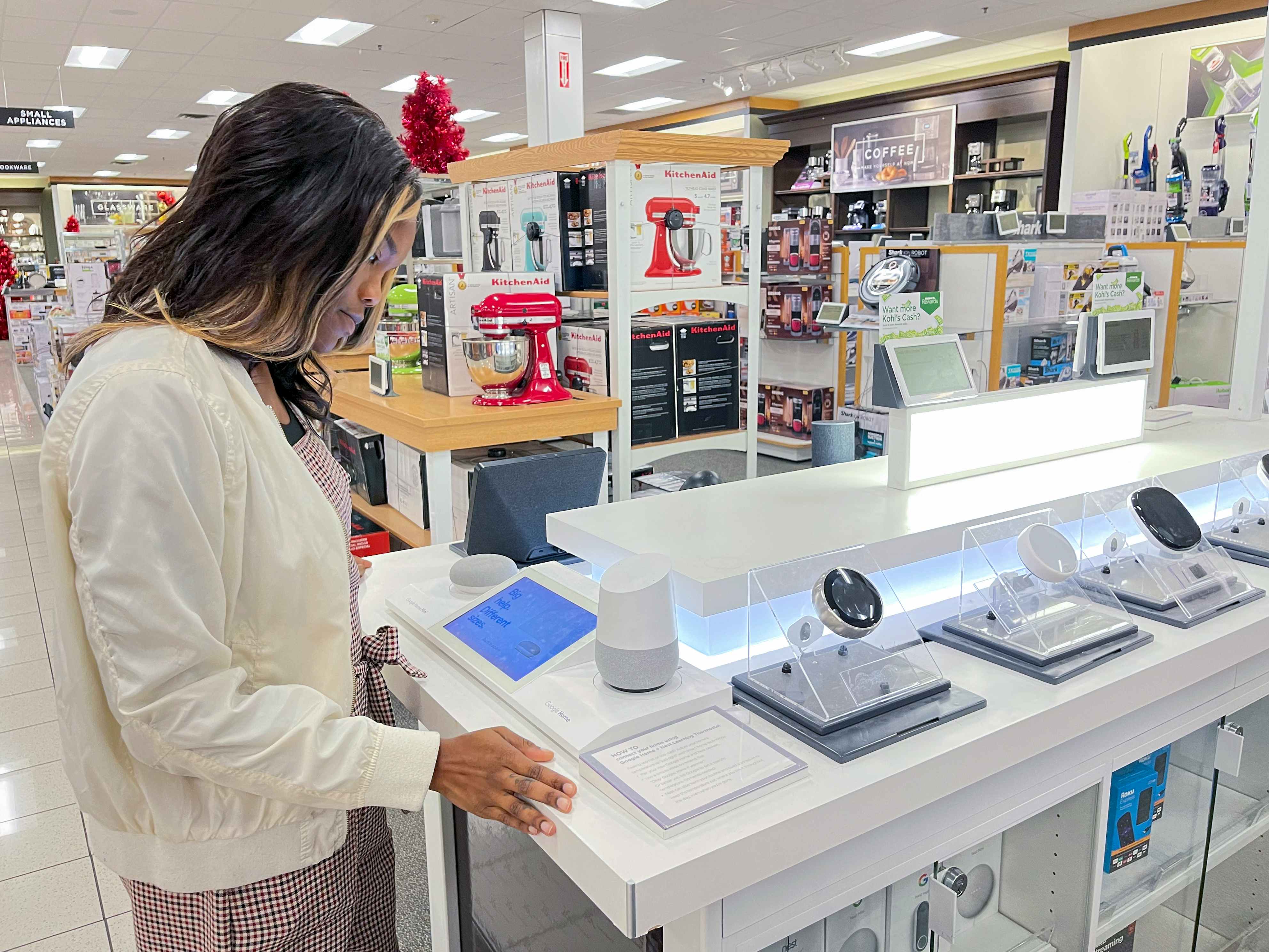 I woman looking at smart home devices