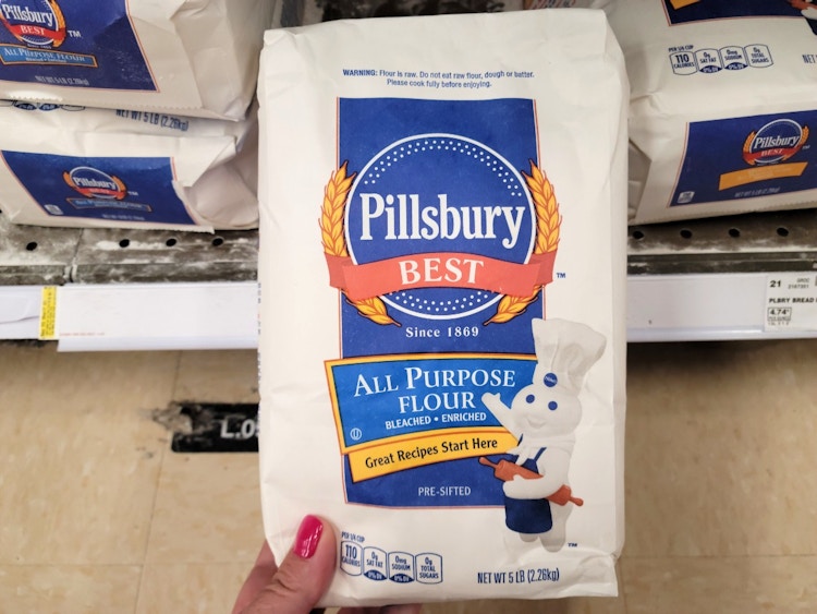 someone holding flour