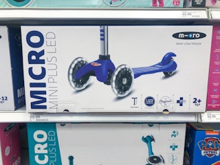 micro kickboar mini plus led scooter on a target shelf