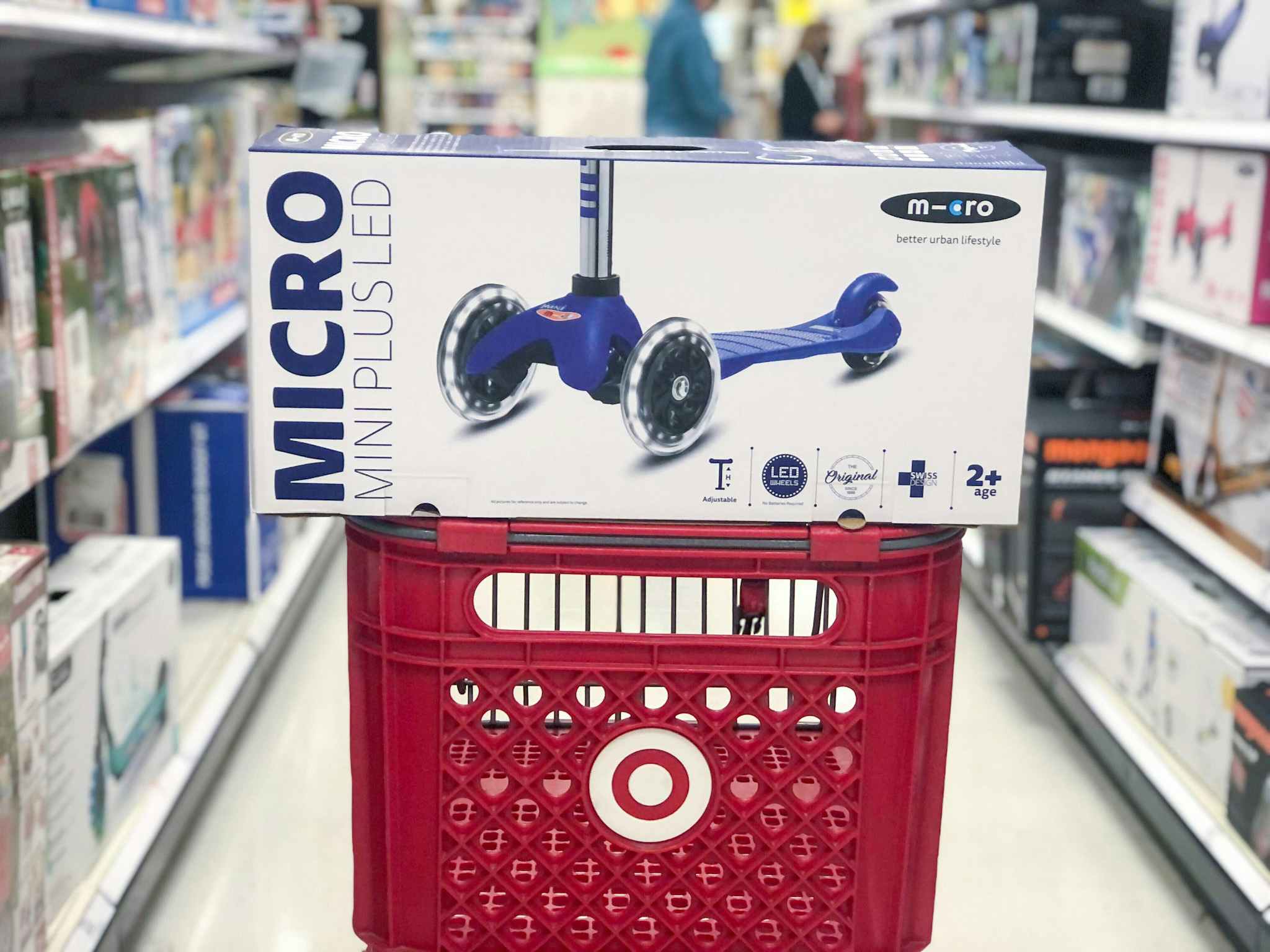 micro kickboar mini plus led scooter on a target cart