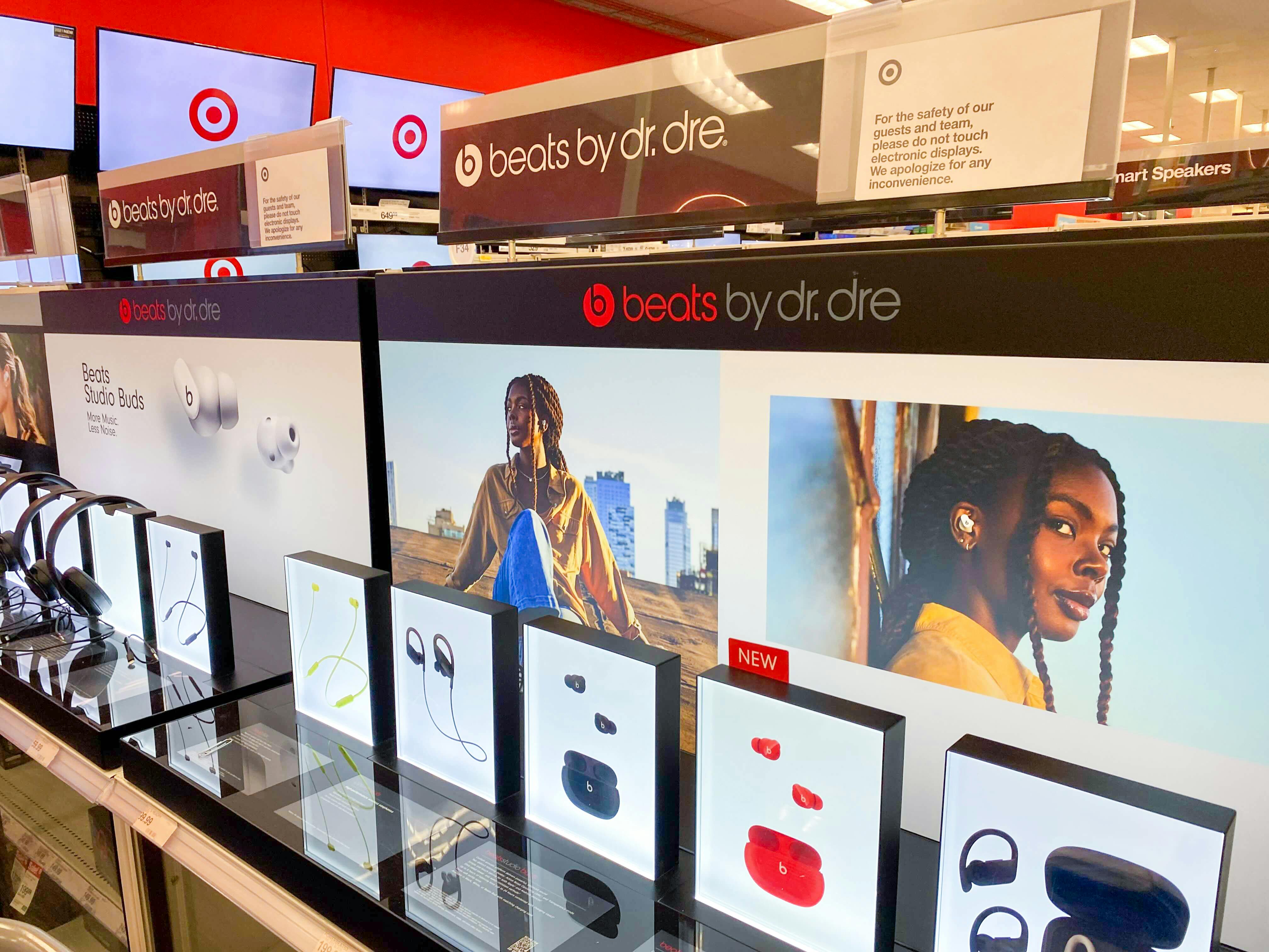 The Beats by Dre wireless earbud display in the Target electronics section.