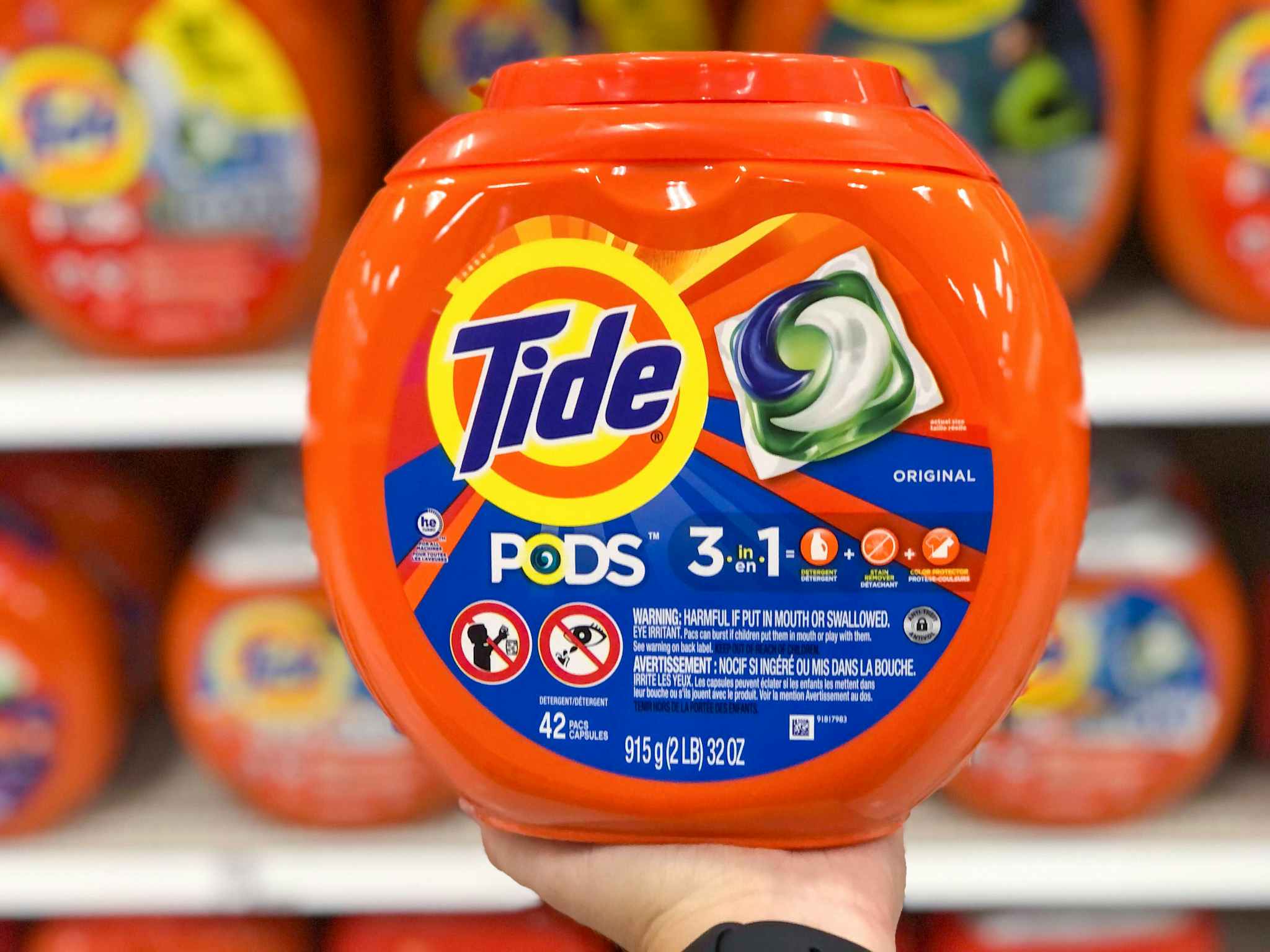 hand holding tide pods at target