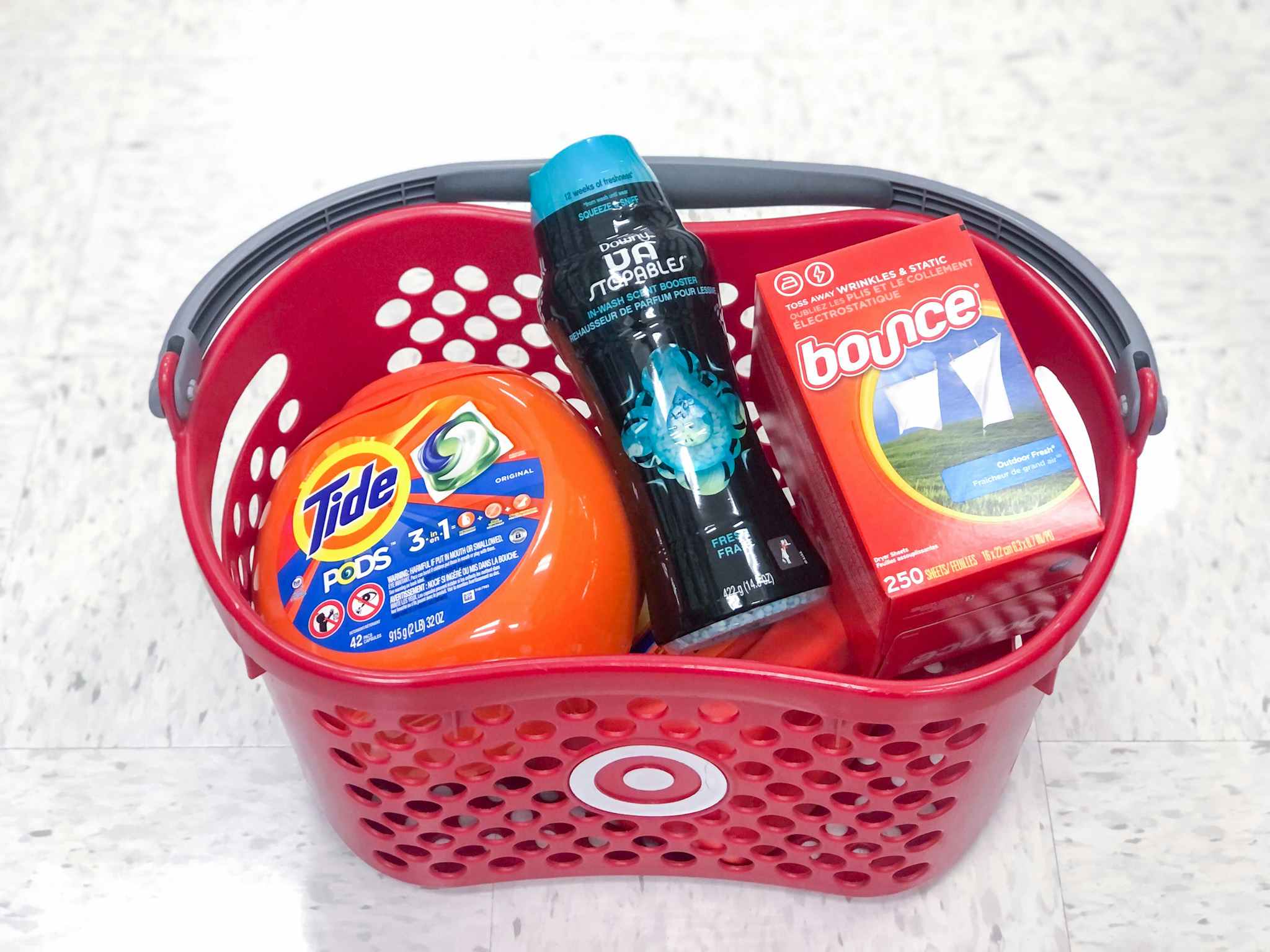 tide bounce and downy in a target basket