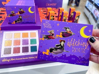 hand holding eyeshadow palette