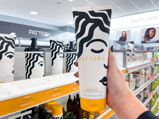 Pattern hair products being held