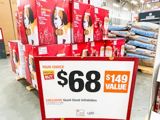 sign for 11-ft inflatable santa at Home Depot