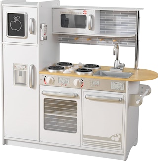 A KidKraft play kitchen with a chalkboard and phone.