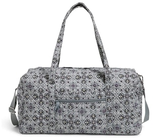 A large Vera Bradley duffel bag.