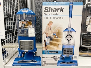 A Shark Navigator Lift-Away Vacuum on display at Bed Bath & Beyond.