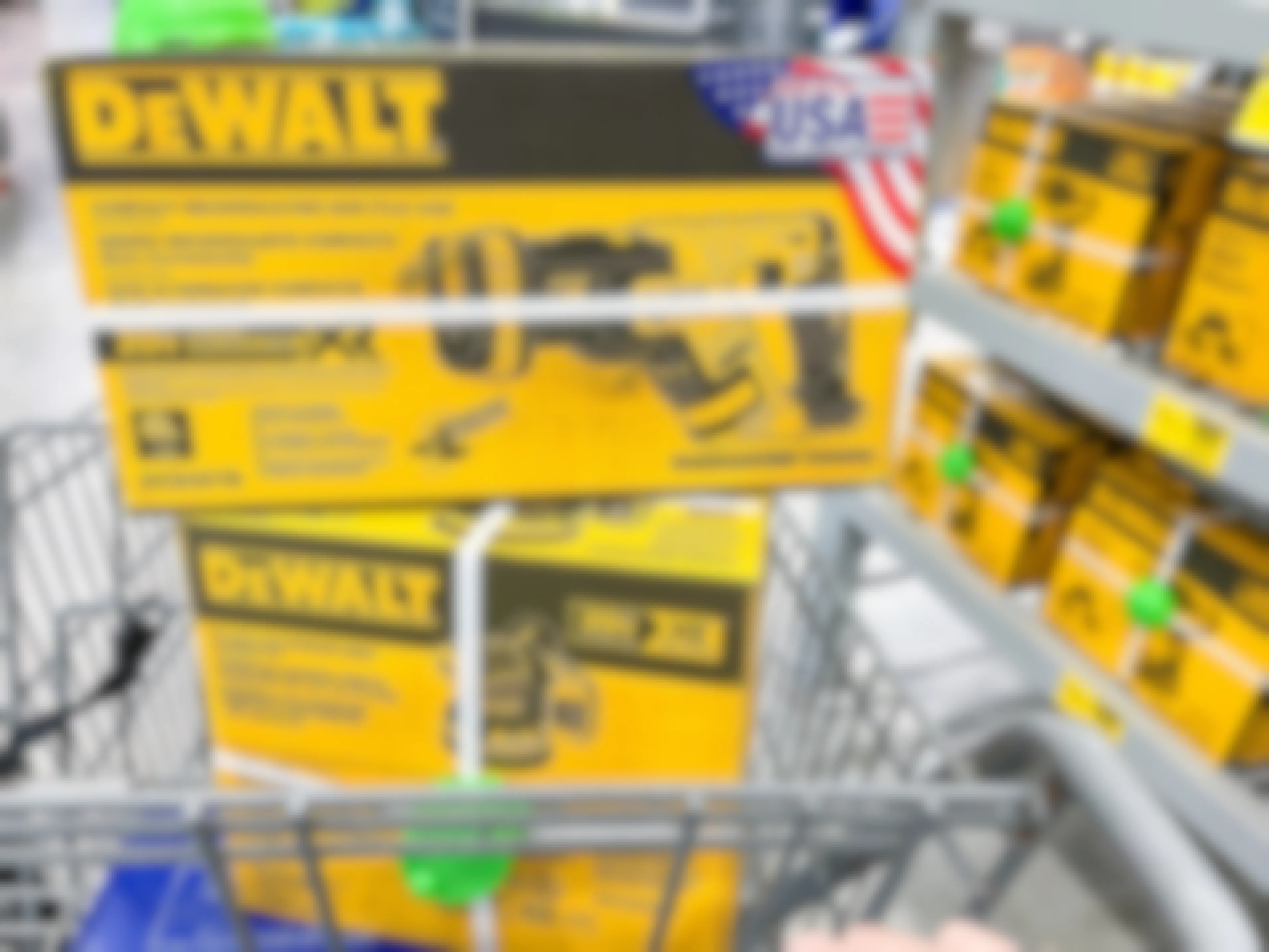 Dewalt power tools in their boxes, sitting in the basket of a shopping cart at Lowe's black friday..