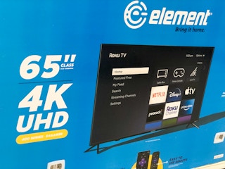 diagonal corner shot of 65" tv box