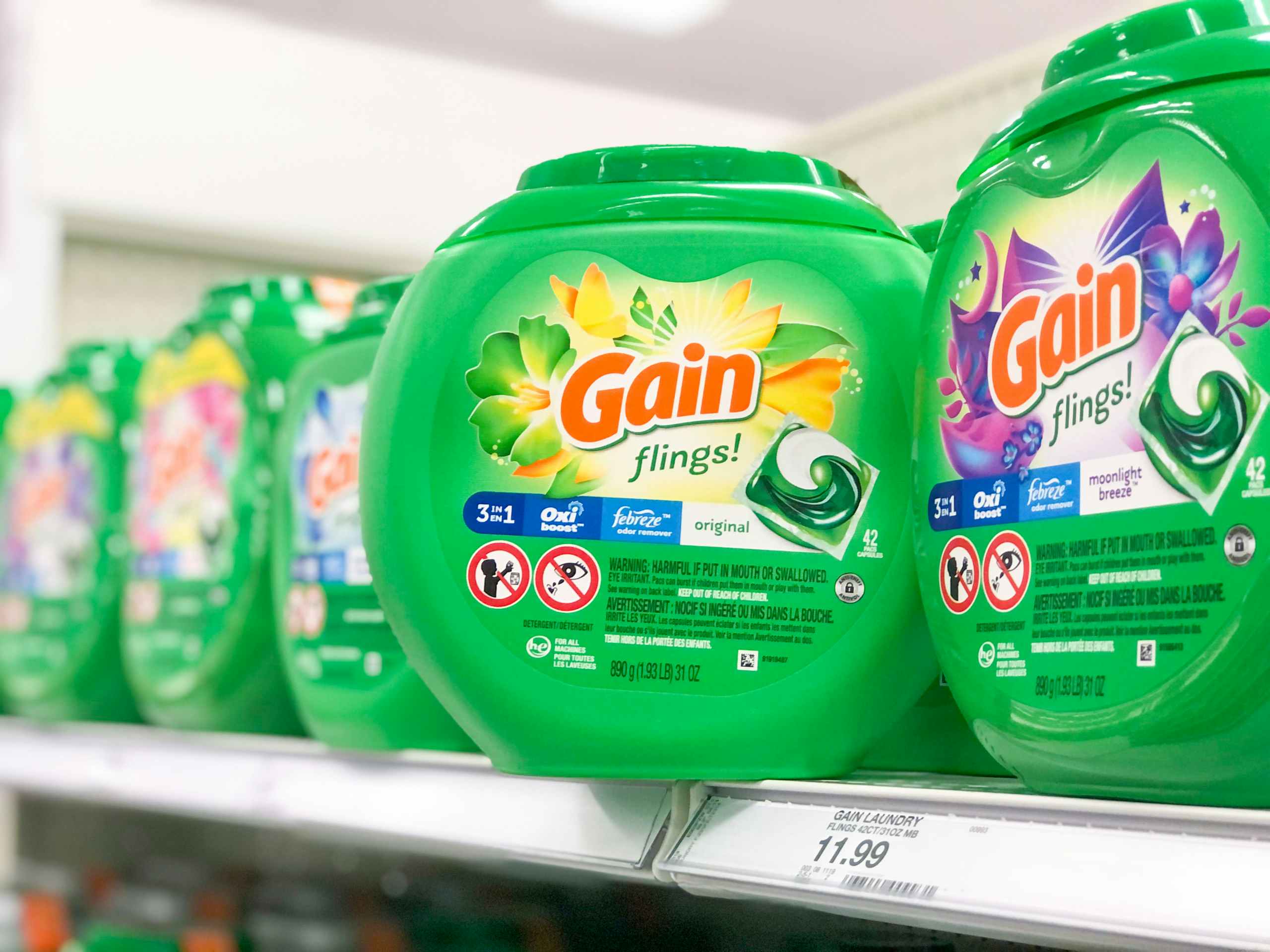 bottle of Gain Flings turned diagonally on a store shelf