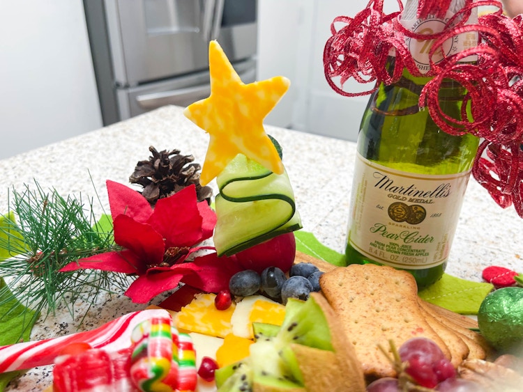 holiday charcuterie board close up of cucumber tree 