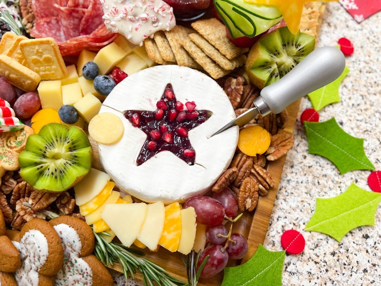 holiday charcuterie board close up of brie 