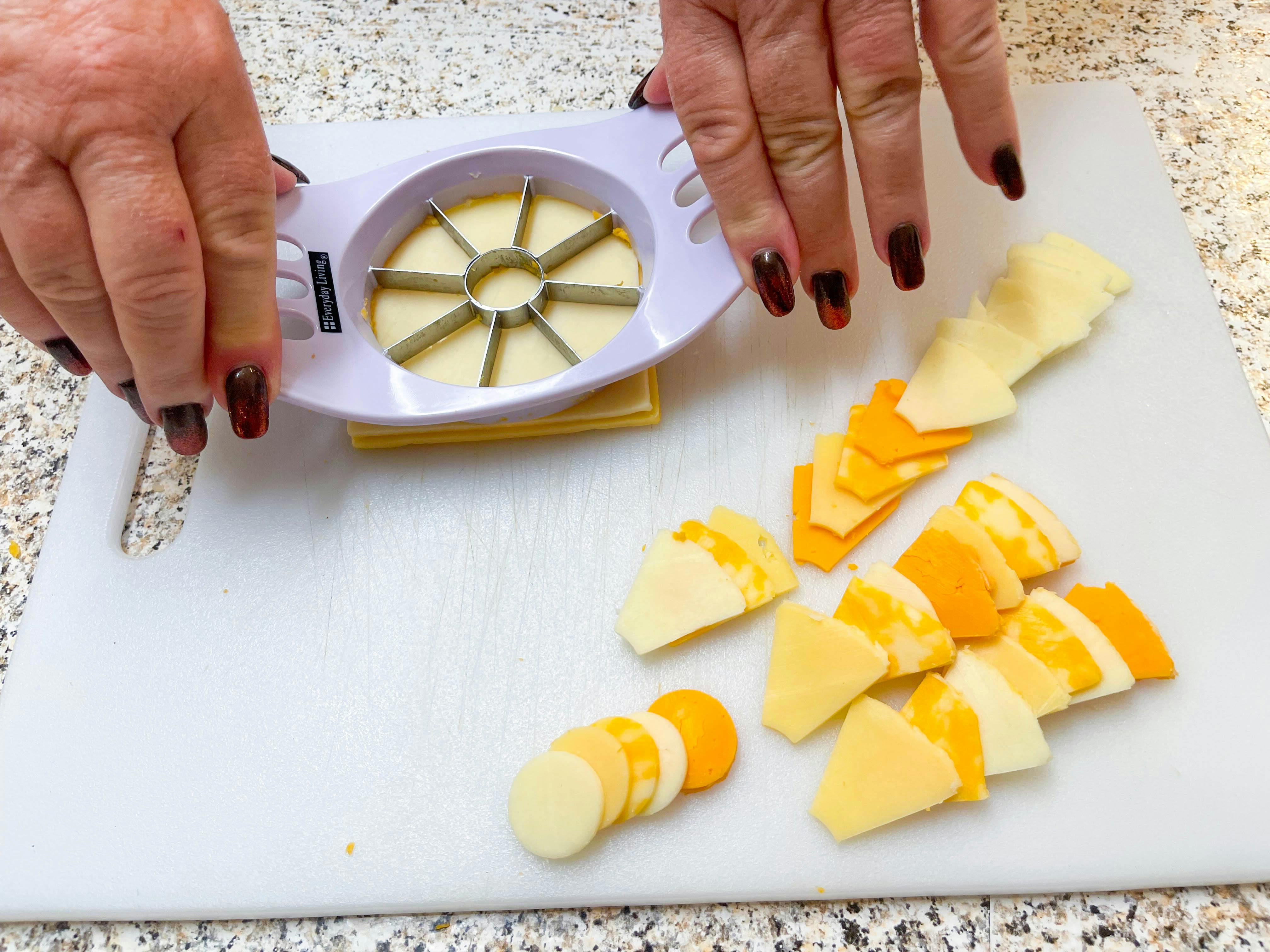 cutting cheese with apple slice 