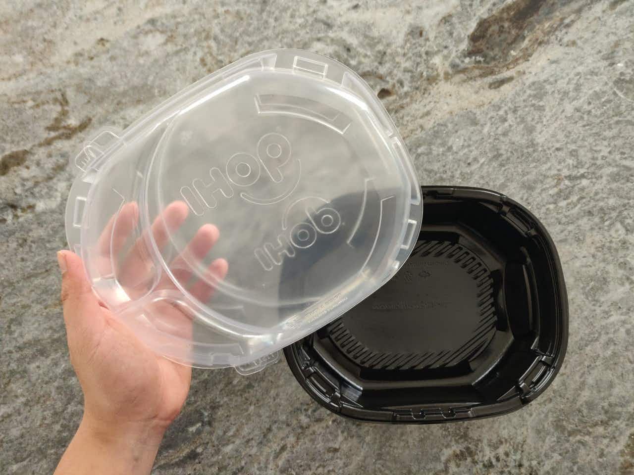 ihop container atop a granite surface. 