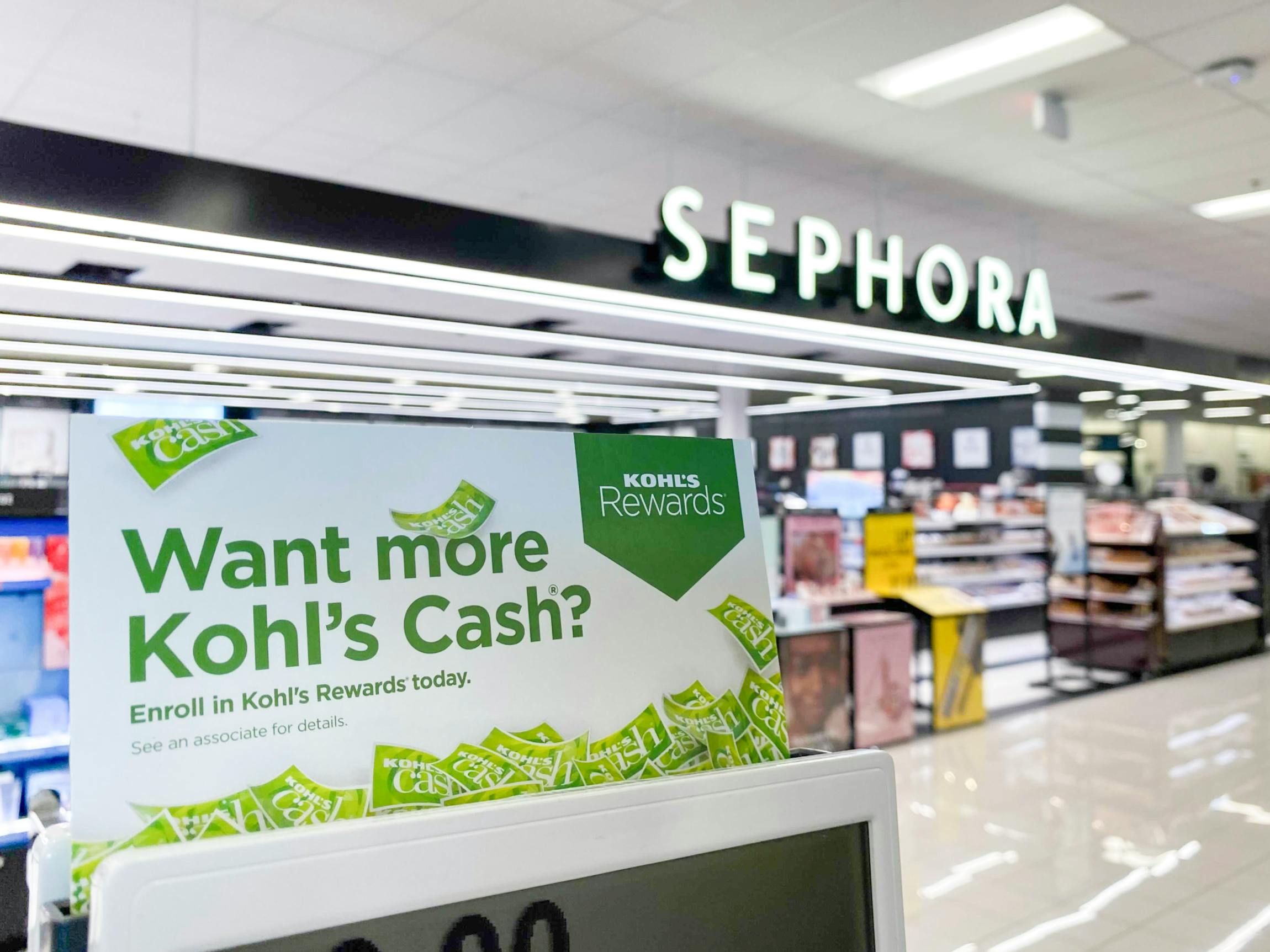 Sign for Kohls cash in front of Sephora part of Kohls