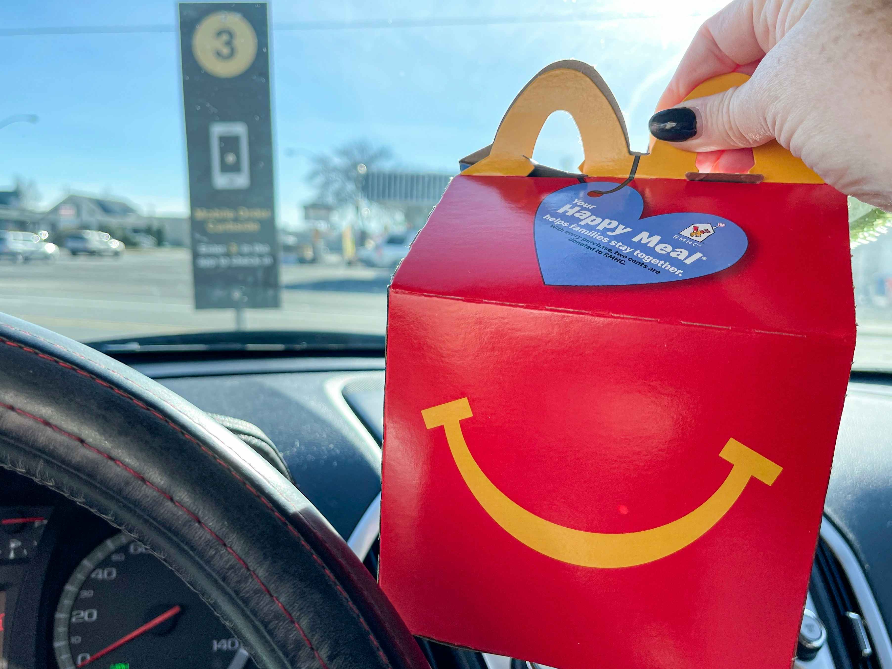 happy meal being held up