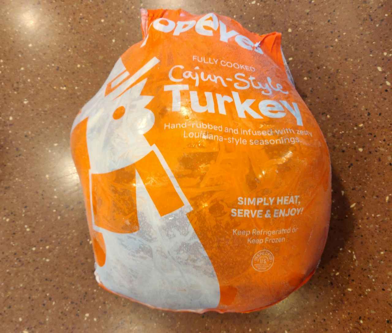 Popeyes Cajun-Style turkey sitting on a counter