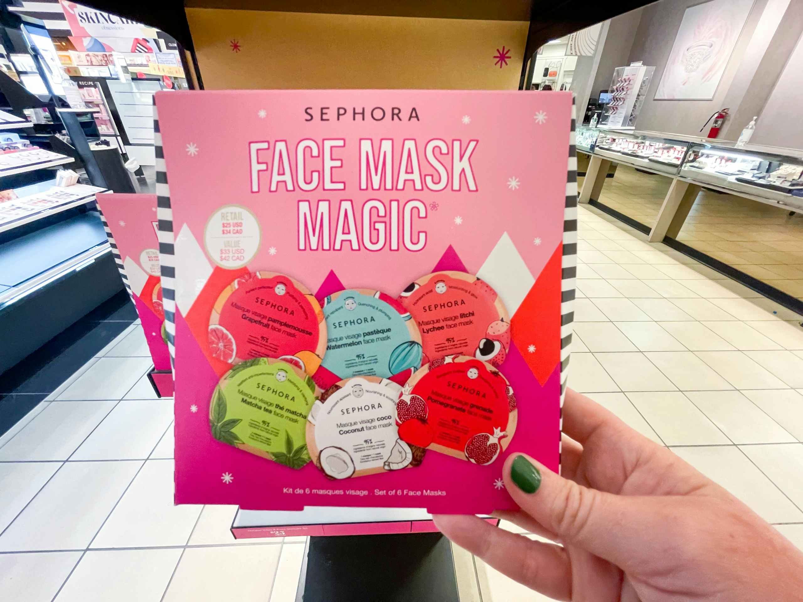 sephora holiday gift sets being held
