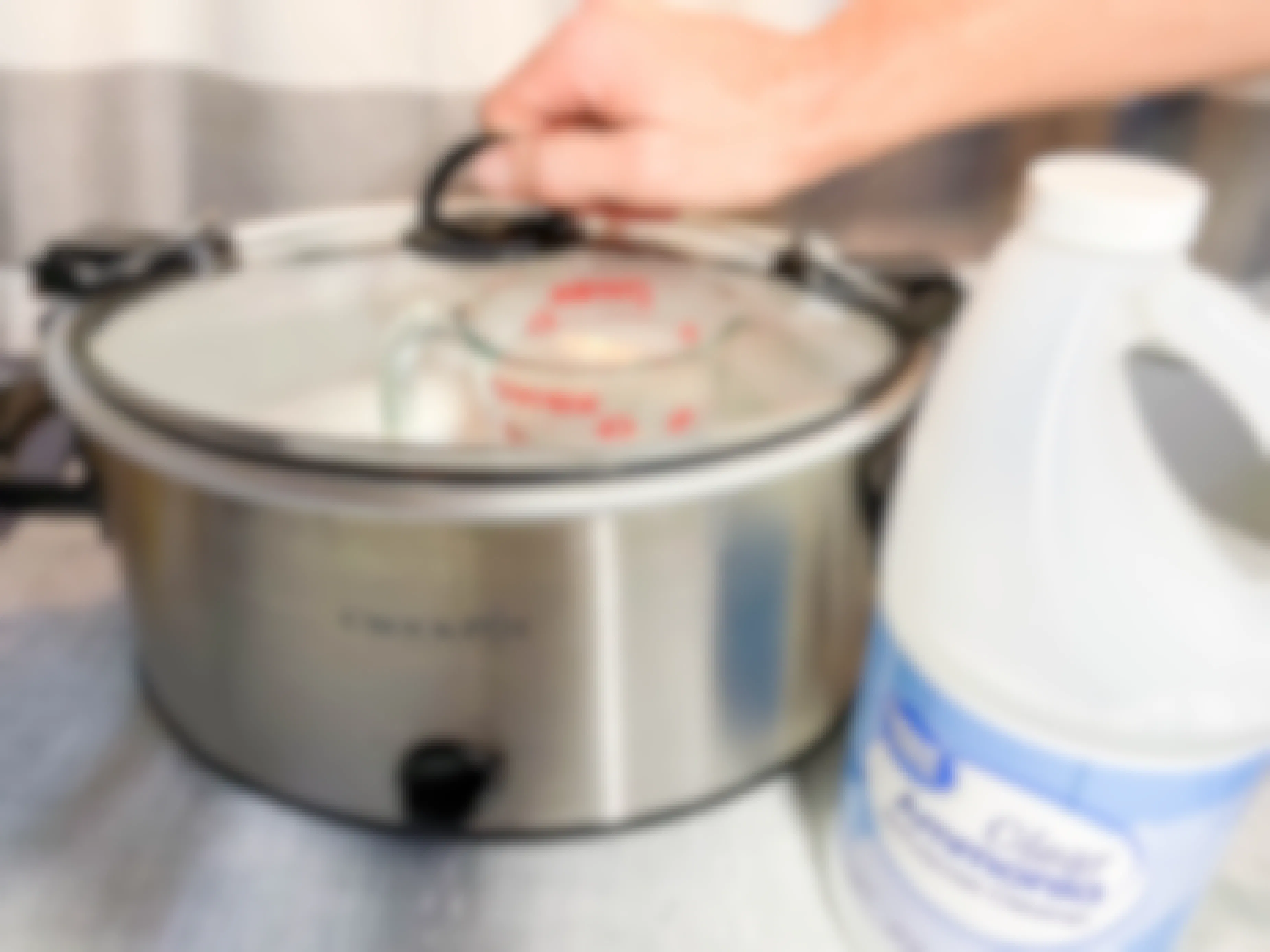 ammonia being poured into crock pot
