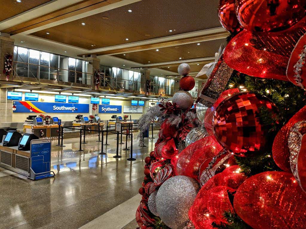 Southwest Airlines ticketing counter with holiday decorations in the foreground