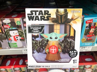 baby yoda inflatable in box on store shelf