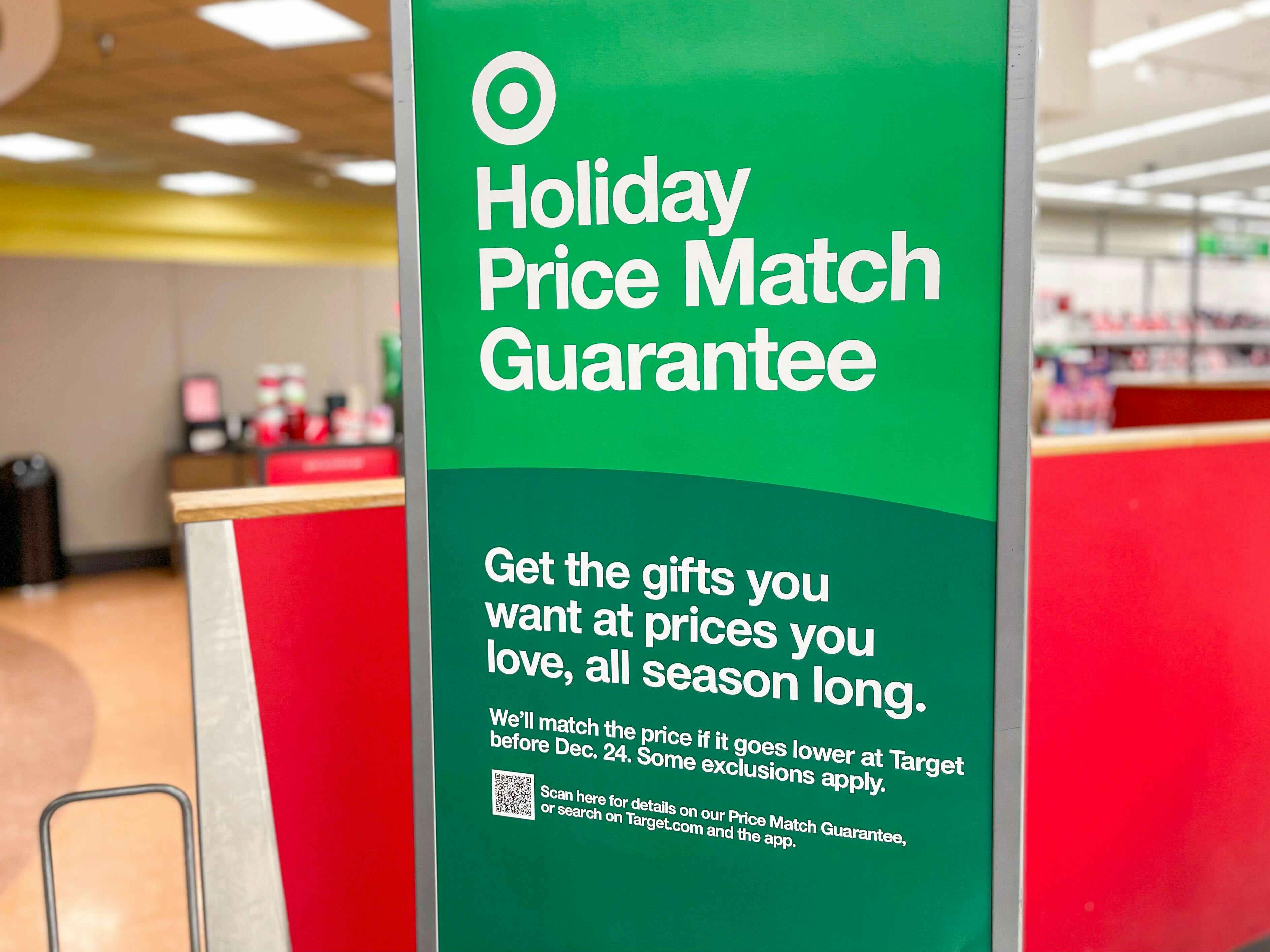 a sign for the Target holiday price match policy