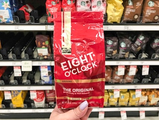 target eight o'clock coffee hand holding