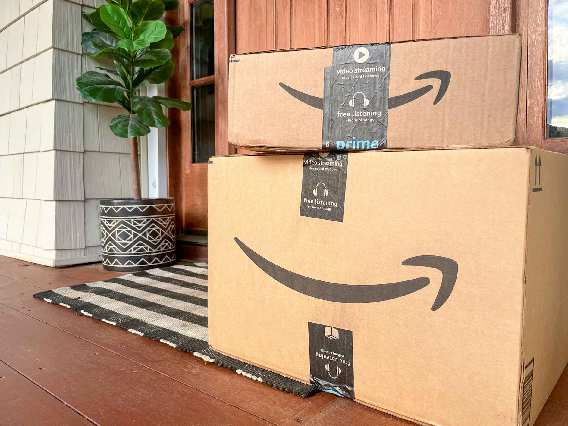 amazon boxes stacked near front door