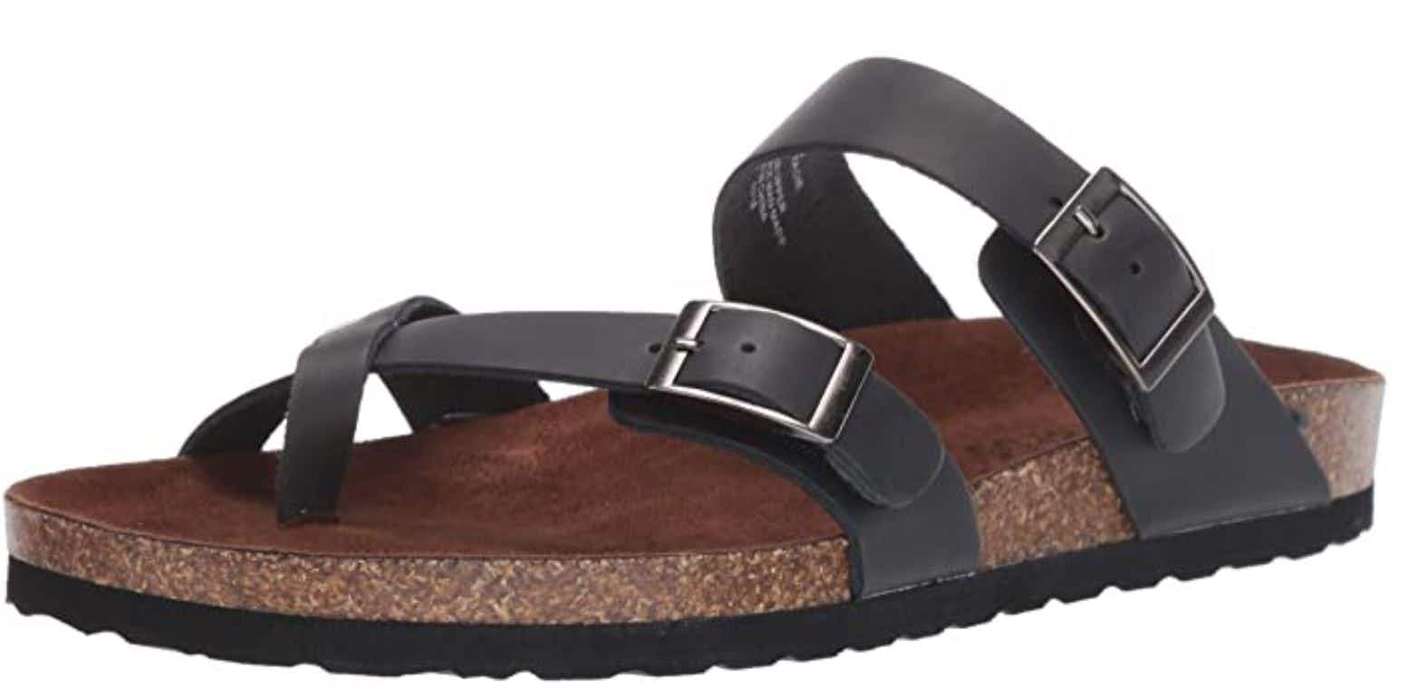 A brown and black Birkenstock-style sandal.