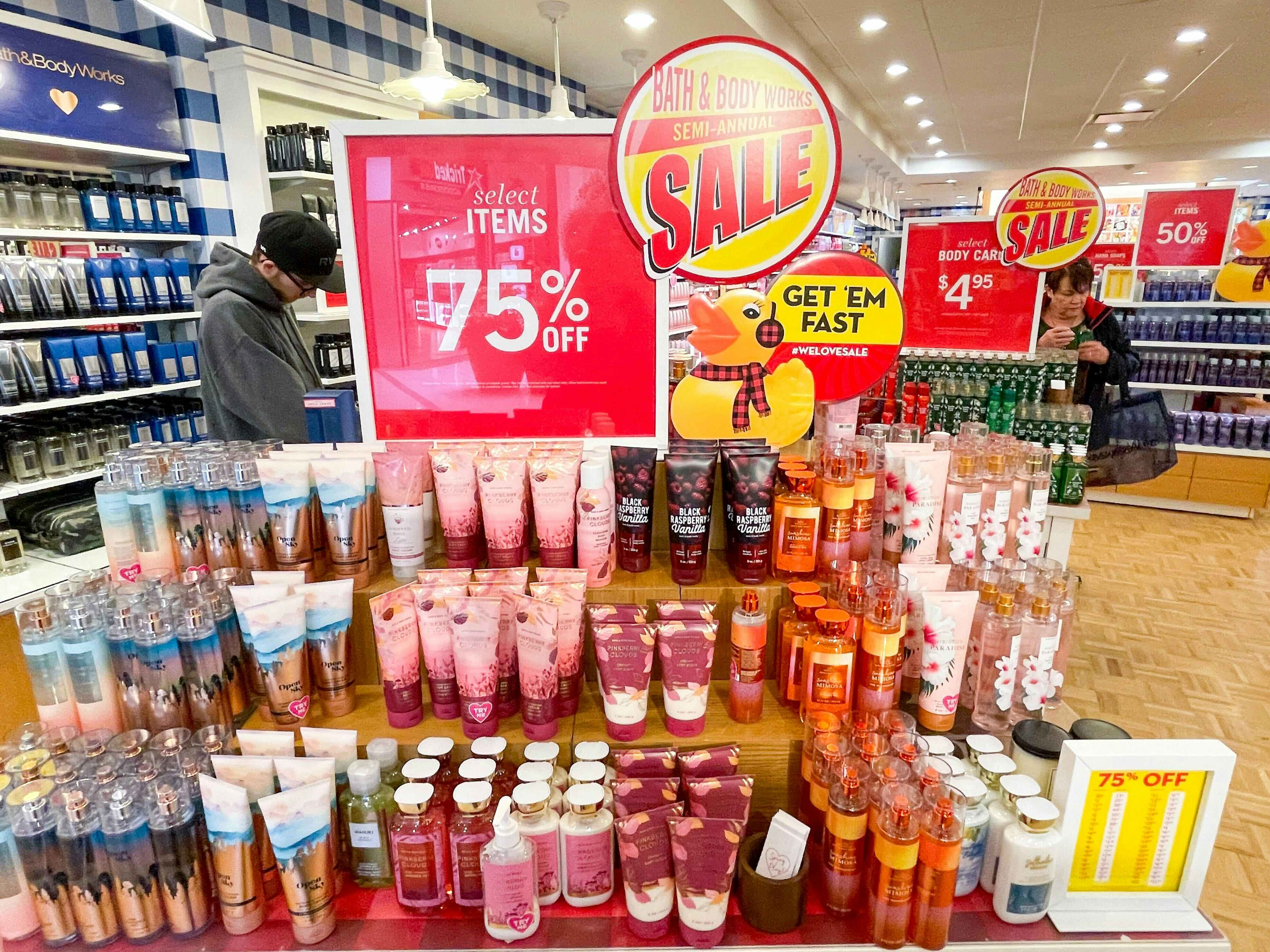 bath and body works sale in store with 75% off signs
